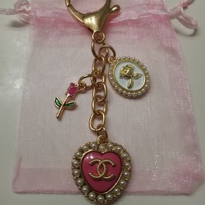 Luxury charm pink rhinestone heart button on an unbranded keychain